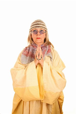 Crazy new age woman with beads in a yellow robe Stock Photo - Budget Royalty-Free & Subscription, Code: 400-04663005