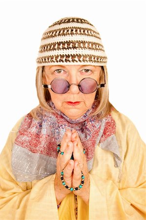 Crazy new age woman with beads in a yellow robe Stock Photo - Budget Royalty-Free & Subscription, Code: 400-04663008