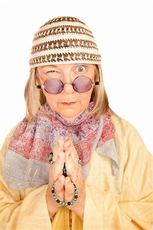Crazy new age woman with beads in a yellow robe Stock Photo - Budget Royalty-Free & Subscription, Code: 400-04663010
