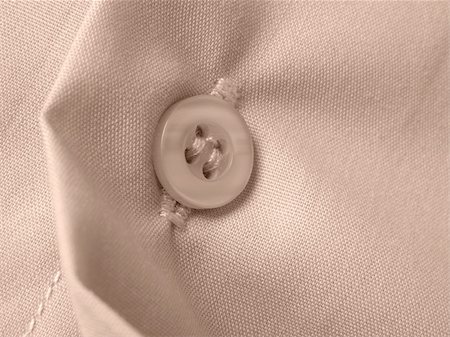 simsearch:400-05303269,k - sepia toned shirt fragment with button closeup Stock Photo - Budget Royalty-Free & Subscription, Code: 400-04663643