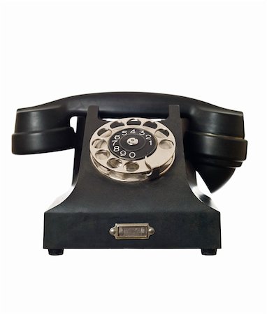 simsearch:400-04666848,k - Retro telephone isolated on a white background Photographie de stock - Aubaine LD & Abonnement, Code: 400-04663694