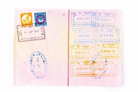 peterkirillov (artist) - Pages of international passport and customs stamps in it Fotografie stock - Microstock e Abbonamento, Codice: 400-04663775