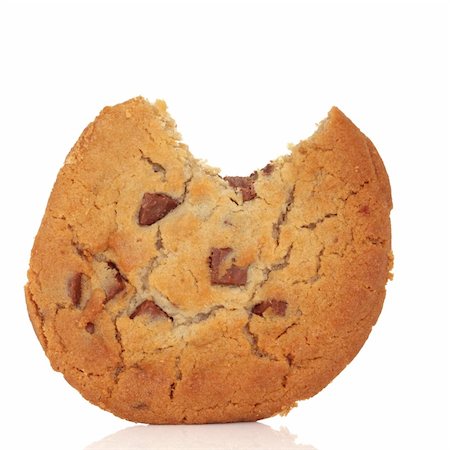 Chocolate chip cookie with a bite taken out, isolated over white background. Stock Photo - Budget Royalty-Free & Subscription, Code: 400-04663935