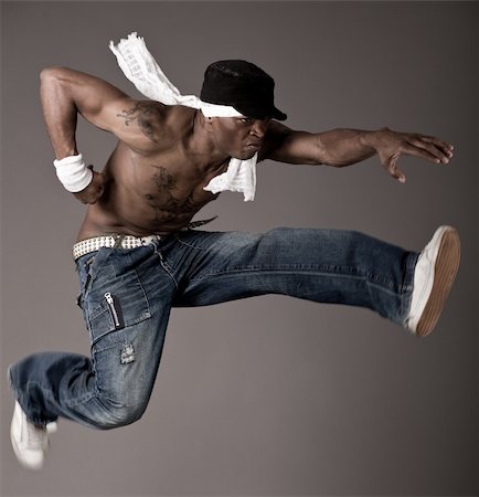 Afro-american make jumping dance Stock Photo - Budget Royalty-Free & Subscription, Code: 400-04674631
