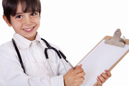 Little boy doctor writes on his clipboard for diagnosis on white background Stock Photo - Budget Royalty-Free & Subscription, Code: 400-04674673