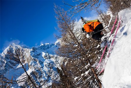 snowed - Young male freeride skier goes downhill in powder snow Mont Blanc Courmayeur Italy Stock Photo - Budget Royalty-Free & Subscription, Code: 400-04674898