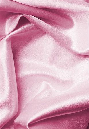 simsearch:630-02220514,k - Pastel pink silk fabric folded, good for background. Stockbilder - Microstock & Abonnement, Bildnummer: 400-04674916