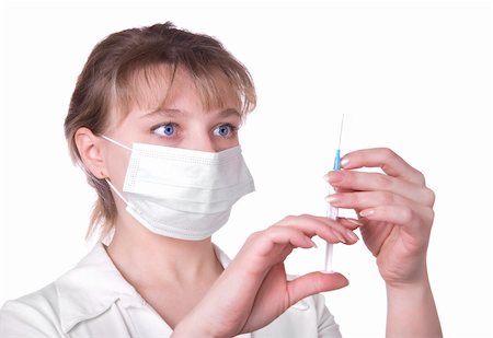 simsearch:400-04626468,k - Young nurse in mask with syringe, isolated on white background Stockbilder - Microstock & Abonnement, Bildnummer: 400-04674967