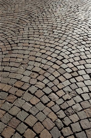 simsearch:400-04932502,k - Cobblestone road background taken in an old European city. Photographie de stock - Aubaine LD & Abonnement, Code: 400-04675096