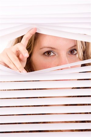 woman hands apart on the window blinds Stockbilder - Microstock & Abonnement, Bildnummer: 400-04675475