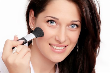 simsearch:400-04736335,k - Beautiful brunette woman doing makeup Photographie de stock - Aubaine LD & Abonnement, Code: 400-04675538