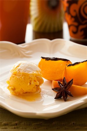 simsearch:400-04781520,k - Ice cream and persimmon with anis star on plate Photographie de stock - Aubaine LD & Abonnement, Code: 400-04675606