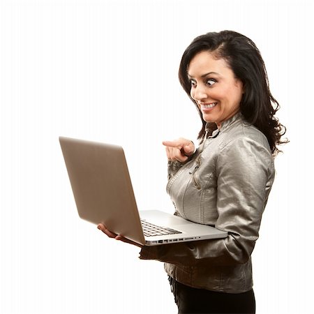 simsearch:400-05285711,k - Hispanic woman pointing to screen of her laptop computer Stock Photo - Budget Royalty-Free & Subscription, Code: 400-04675941