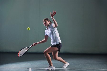 young girl exercise tennis sport indoor Stock Photo - Budget Royalty-Free & Subscription, Code: 400-04676021