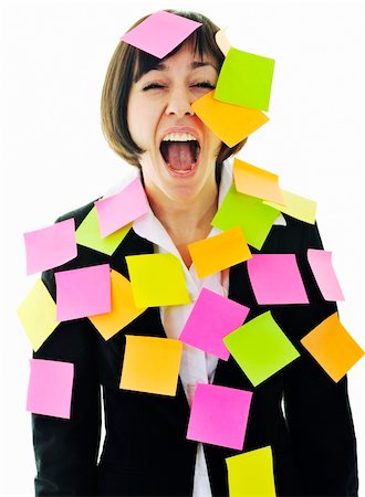 one frustrated young business woman with many of post it representing concept memory and frustration on work Stock Photo - Budget Royalty-Free & Subscription, Code: 400-04676065