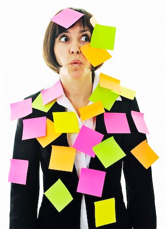 one frustrated young business woman with many of post it representing concept memory and frustration on work Stock Photo - Budget Royalty-Free & Subscription, Code: 400-04676063