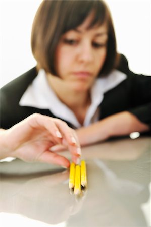 young business woman choosing right yellow pencil and representing concept of perfection and order Stock Photo - Budget Royalty-Free & Subscription, Code: 400-04676079