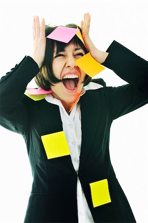 one frustrated young business woman with many of post it representing concept memory and frustration on work Stock Photo - Budget Royalty-Free & Subscription, Code: 400-04676071