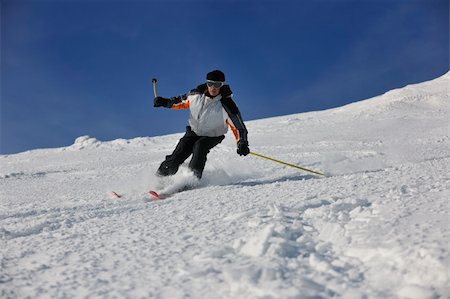 simsearch:400-03938721,k - skier free ride downhill at winter season on beautiful sunny day Photographie de stock - Aubaine LD & Abonnement, Code: 400-04676207