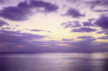 simsearch:400-05333534,k - Purple dusk sea and a ship trace. Long exposure. Stockbilder - Microstock & Abonnement, Bildnummer: 400-04676258