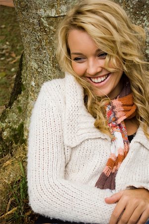 young blond girl under a tree in the Autumn fall Stock Photo - Budget Royalty-Free & Subscription, Code: 400-04676259