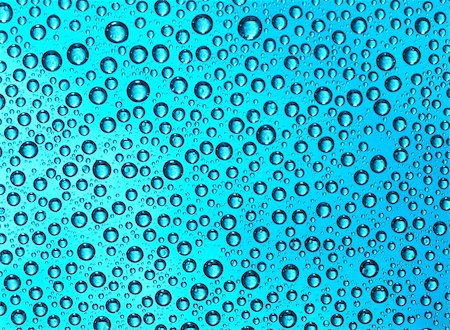 dew drops on glass - Blue water drop background. Nature collection. Stock Photo - Budget Royalty-Free & Subscription, Code: 400-04676709