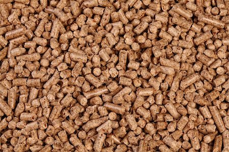 fine closeup image of natural wood pellet on white Stock Photo - Budget Royalty-Free & Subscription, Code: 400-04676910
