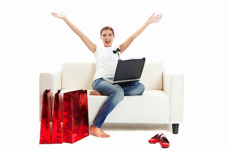 Beautiful young woman at home doing online shop, Consumerism concept Stock Photo - Budget Royalty-Free & Subscription, Code: 400-04677431