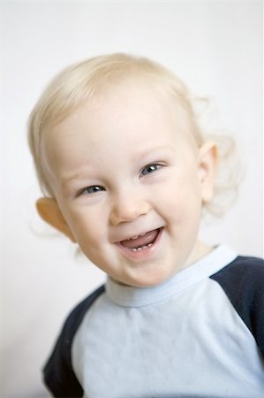 simsearch:400-04677805,k - Happy baby blond boy at home Photographie de stock - Aubaine LD & Abonnement, Code: 400-04677805
