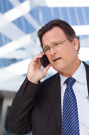 simsearch:400-04608943,k - Concerned, Stressed Businessman Talks on His Cell Phone. Stock Photo - Budget Royalty-Free & Subscription, Code: 400-04677911