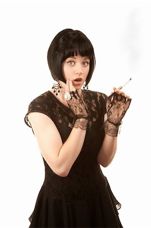 smoke ring - Retro woman with black hair and Parisian 1950s dress Stock Photo - Budget Royalty-Free & Subscription, Code: 400-04678506