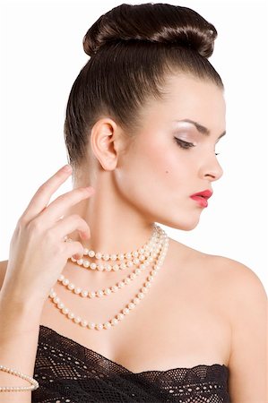 young woman brunette with a strip lace around her breast and wearing a pearl necklace Foto de stock - Super Valor sin royalties y Suscripción, Código: 400-04679113