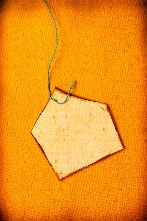 simsearch:400-07405808,k - Close up of handmade paper tag for background Stock Photo - Budget Royalty-Free & Subscription, Code: 400-04679370