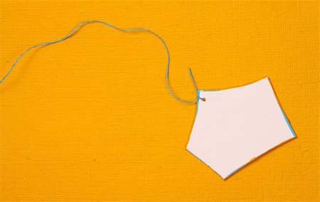 simsearch:400-04752957,k - Close up of handmade paper tag for background Photographie de stock - Aubaine LD & Abonnement, Code: 400-04679393