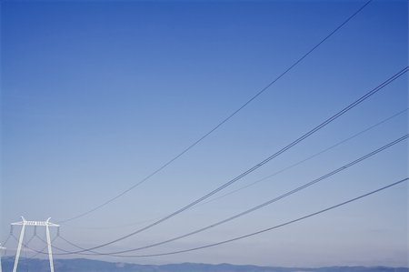 simsearch:400-04364211,k - High voltage power lines on blue sky Photographie de stock - Aubaine LD & Abonnement, Code: 400-04679579