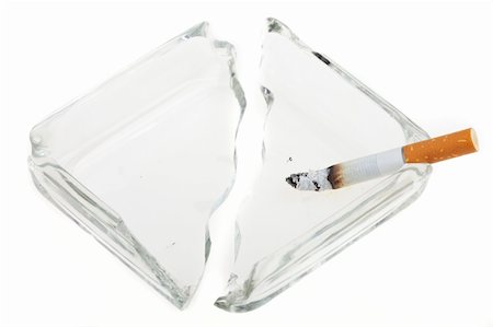 cigarette on a broken ashtray isolated on white Stock Photo - Budget Royalty-Free & Subscription, Code: 400-04670208