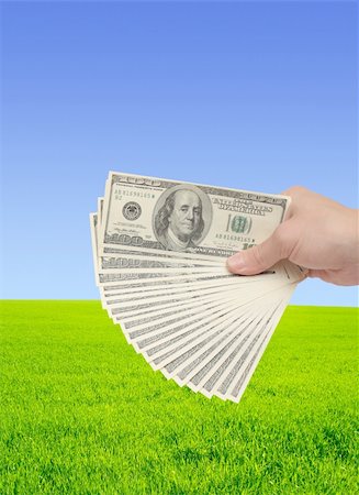 simsearch:400-08282552,k - Hand, holding many of dollar banknotes Stock Photo - Budget Royalty-Free & Subscription, Code: 400-04670279