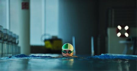simsearch:400-04731600,k - health and fitness lifestyle concept with young athlete swimmer recreating  on olimpic pool Stock Photo - Budget Royalty-Free & Subscription, Code: 400-04670346