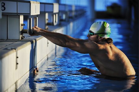 simsearch:400-04731600,k - health and fitness lifestyle concept with young athlete swimmer recreating  on olimpic pool Stock Photo - Budget Royalty-Free & Subscription, Code: 400-04670341