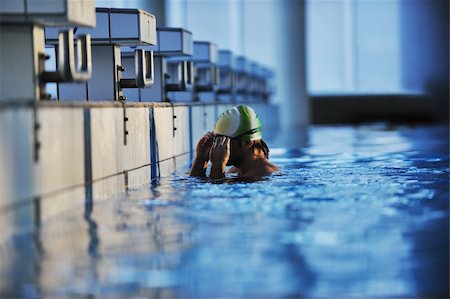 simsearch:400-04731600,k - health and fitness lifestyle concept with young athlete swimmer recreating  on olimpic pool Stock Photo - Budget Royalty-Free & Subscription, Code: 400-04670352