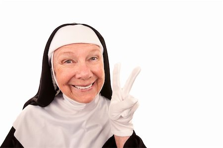 simsearch:400-05315102,k - Funny Nun Making A Peace Sign with Gloved Hand Photographie de stock - Aubaine LD & Abonnement, Code: 400-04670439