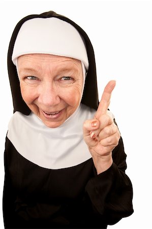simsearch:400-04671065,k - Funny Nun with Happy Expression on her Face Pointing a Finger Stock Photo - Budget Royalty-Free & Subscription, Code: 400-04670442