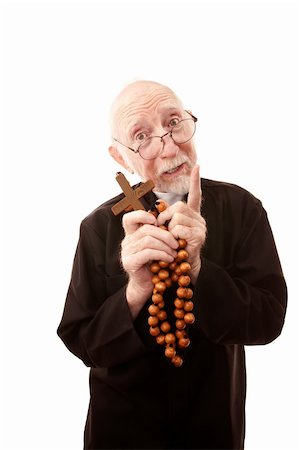 simsearch:400-04278950,k - Funny priest with beads and large wooden cross Fotografie stock - Microstock e Abbonamento, Codice: 400-04670456