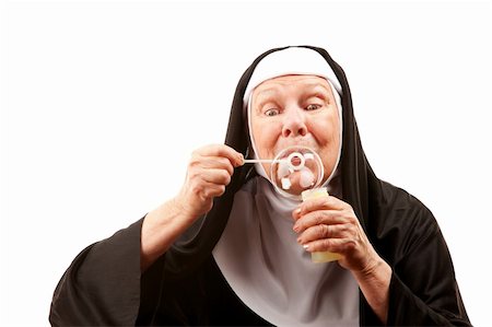 simsearch:400-04671065,k - Funny nun in religious habit blowing bubble Stock Photo - Budget Royalty-Free & Subscription, Code: 400-04670466