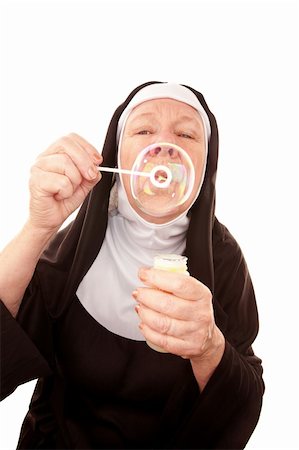 simsearch:400-04671065,k - Funny Nun in Black Habit Blowing a Bubble Stock Photo - Budget Royalty-Free & Subscription, Code: 400-04670462
