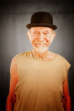 elderly bowlers - Crazy senior man in bowler hat on white background Stock Photo - Budget Royalty-Free & Subscription, Code: 400-04670521