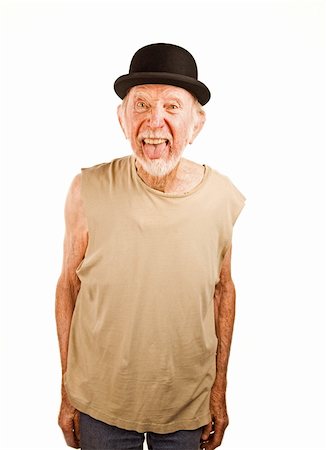 simsearch:400-04227846,k - Crazy senior man in bowler hat sticking out his tongue Fotografie stock - Microstock e Abbonamento, Codice: 400-04670522