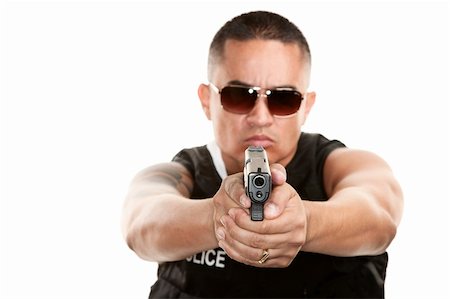 simsearch:400-04172754,k - Hispanic Cop in Bulletproof Vest Aiming Pistol Stock Photo - Budget Royalty-Free & Subscription, Code: 400-04670603