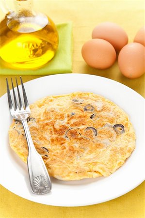 mushrooms olives and potatoes omelette typical Spanish cuisine Stock Photo - Budget Royalty-Free & Subscription, Code: 400-04670861