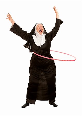 simsearch:400-04671065,k - Funny nun in socks excercising with toy plastic hoop Stock Photo - Budget Royalty-Free & Subscription, Code: 400-04671064